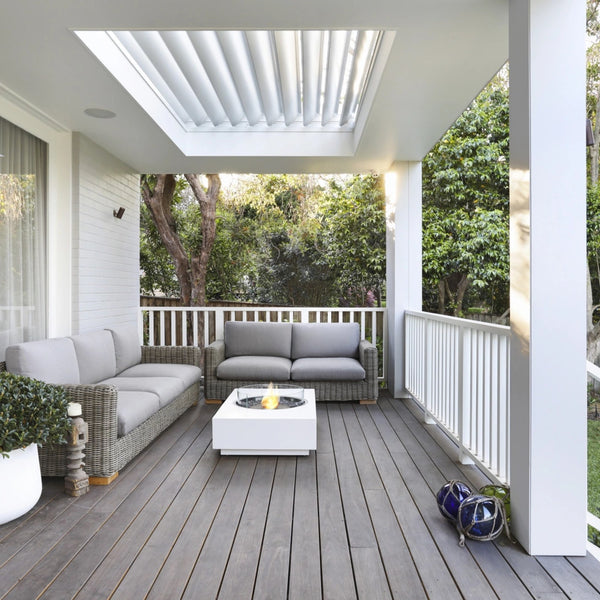EcoSmart Martini 50 fire table on a covered Australian verandah with outdoor lounge seating.