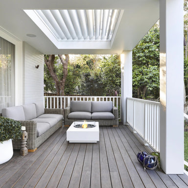 EcoSmart Martini 50 fire table on a covered Australian verandah with outdoor lounge seating.