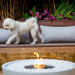 EcoSmart Mix 850 Fire Pit in Bone finish on a patio with decorative stone media.