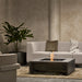 EcoSmart Mojito 40 fire table lit in a minimalist lounge, close view of the flame and concrete body.