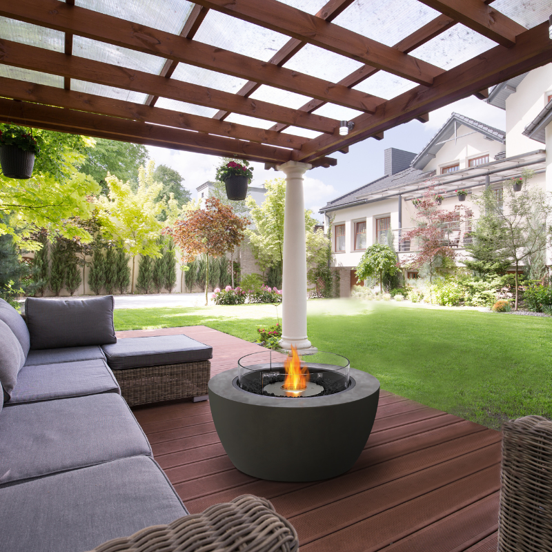 EcoSmart Pod 40 bioethanol fire pit on covered patio, outdoor fire feature for alfresco living
