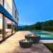 EcoSmart Pod 40 and Pod 30 Fire Pits beside a modern pool, showing both sizes in the Pod range.