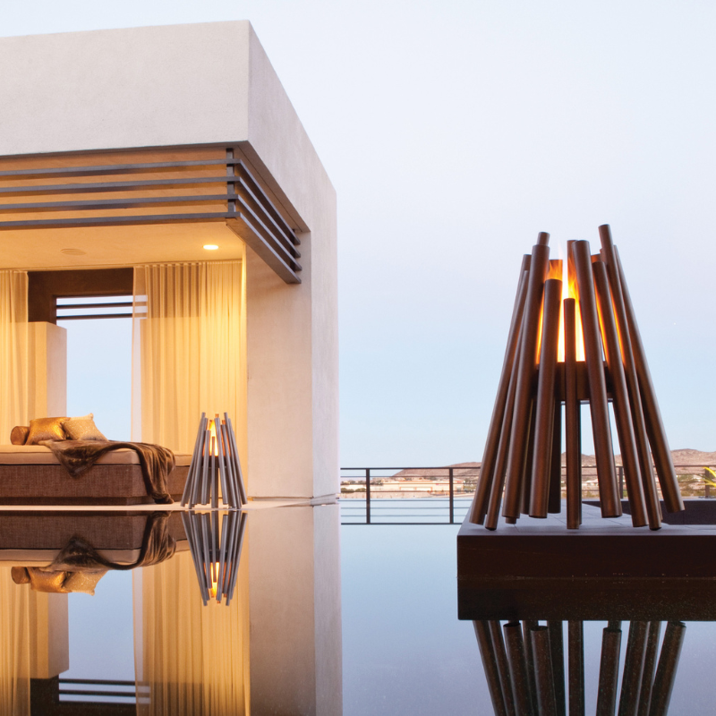 EcoSmart Stix Fire Pit price feature image in premium poolside evening setting