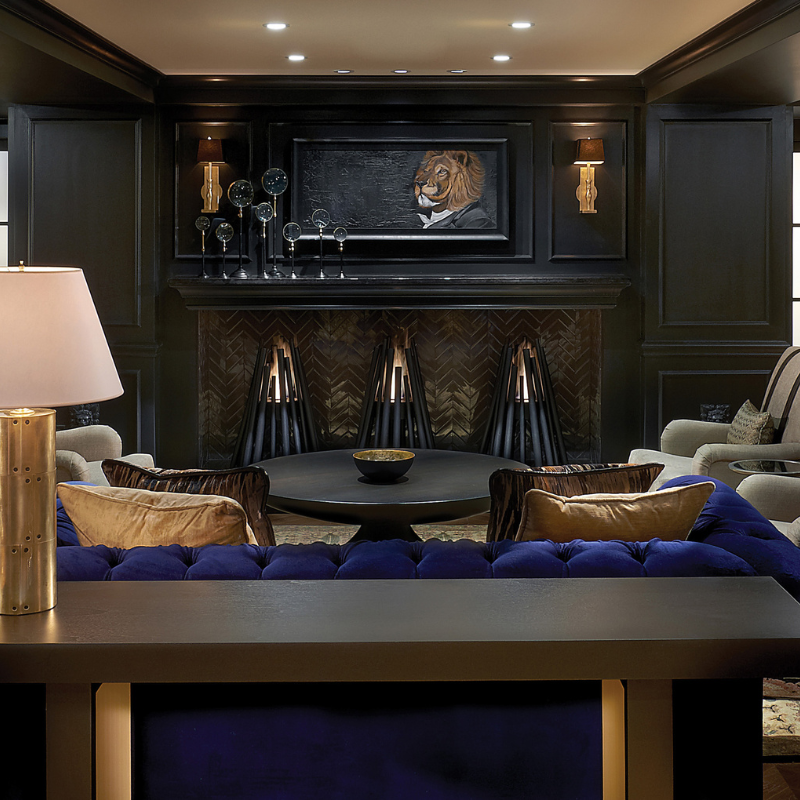 EcoSmart Stix Fire Pit reviews image showing three black Stix fire features in luxury lounge fireplace setting