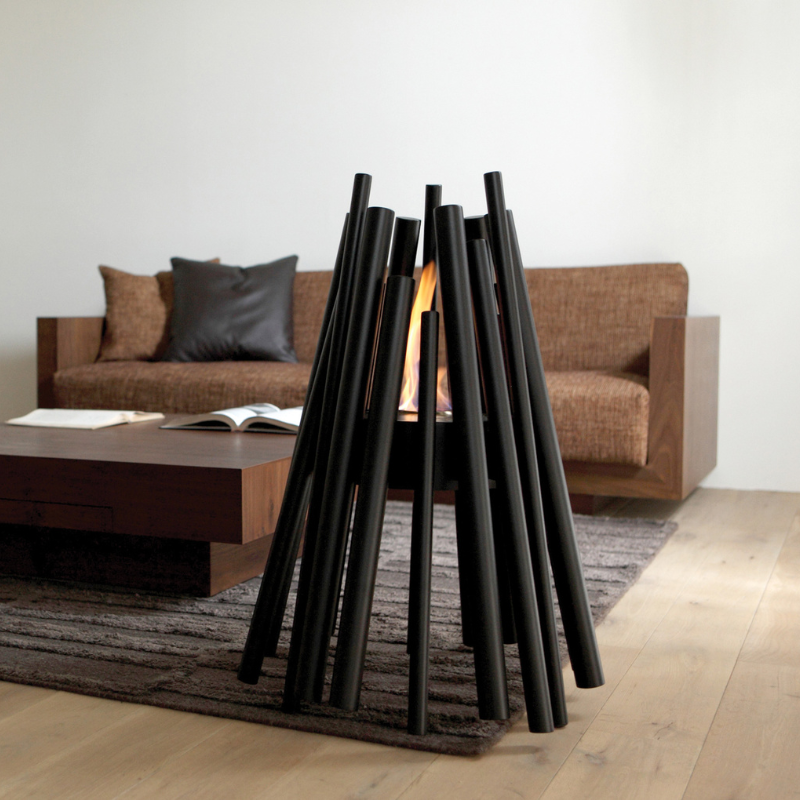 EcoSmart Stix Fire Pit black finish styled as a safe indoor fire pit in modern living room