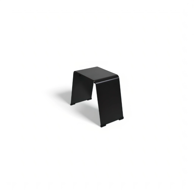 Black steel stool accessory for the Fabrizio Fire Pit, shown on a plain studio background to highlight its minimalist curved design and matching outdoor furniture style