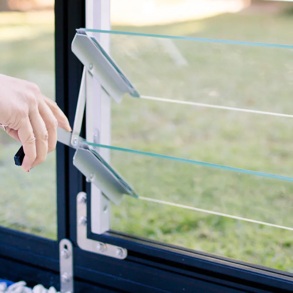 Glass louvre vent kit blades open for greenhouse airflow