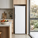 Husky 237L vertical fridge as a tall larder fridge in a modern Australian kitchen with oak and stone cabinetry