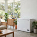 Husky white chest fridge and freezer used as a drinks fridge in a bright open-plan Australian living and entertaining room