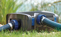 AquaMax Eco Premium 12 V pump running beside a natural swimming pond