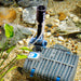 Oase Filtral UVC 6000 running a fountain in a garden pond