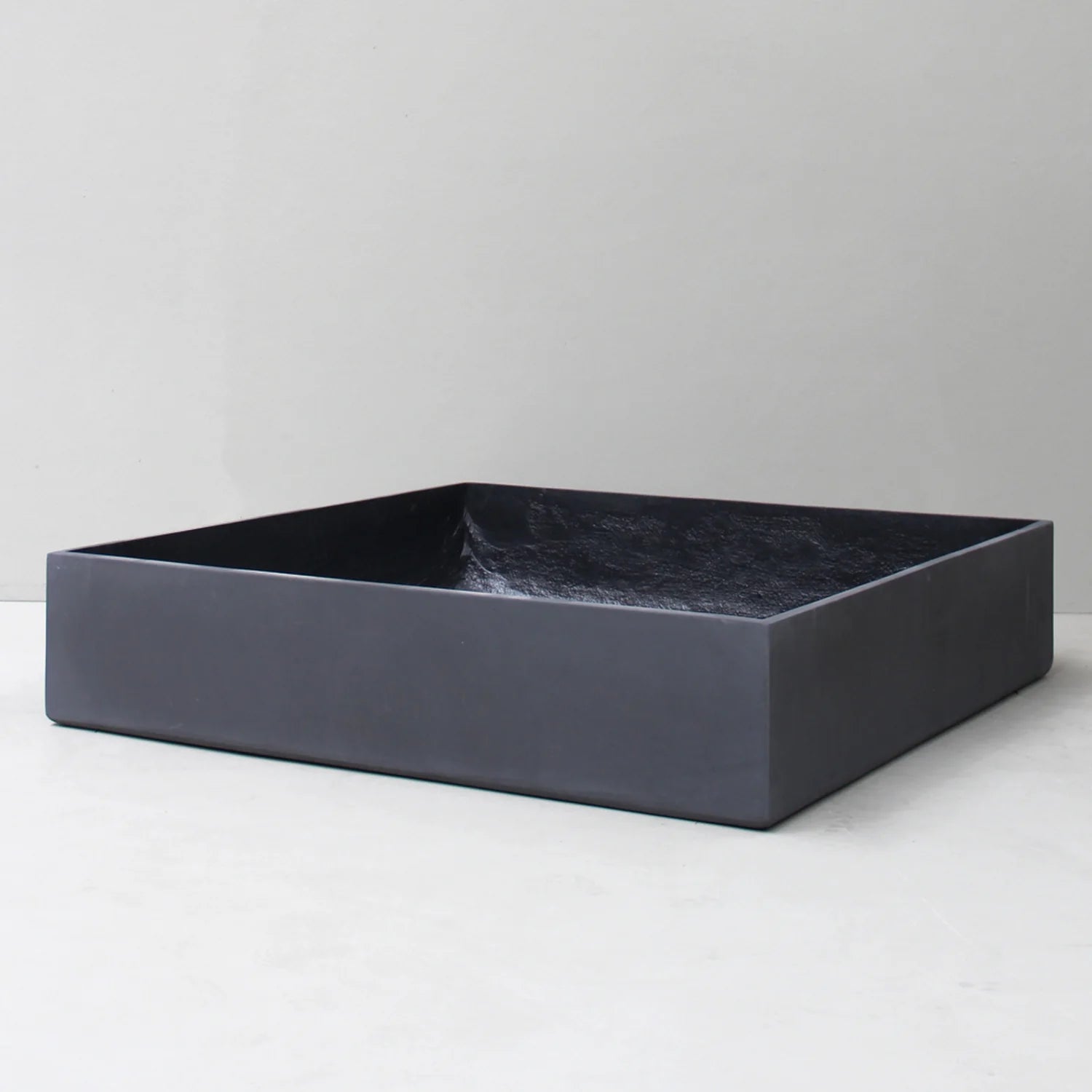 Kellock Reservoir Square Pond Base in pigmented charcoal, studio shot