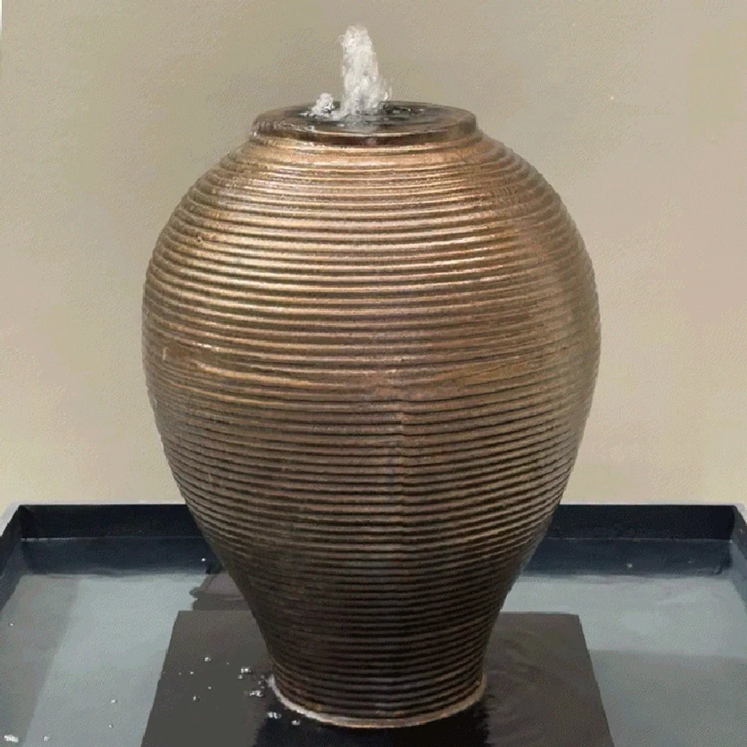 Kellock Ribbed Egg Jar Water Feature in heavy metal, front view