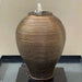 Kellock Ribbed Egg Jar Water Feature in heavy metal, front view