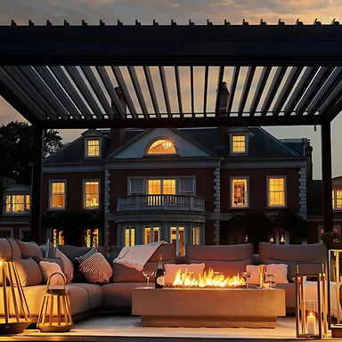 Kustom Mosa adjustable louvre pergola over an evening lounge setting with roof closed
