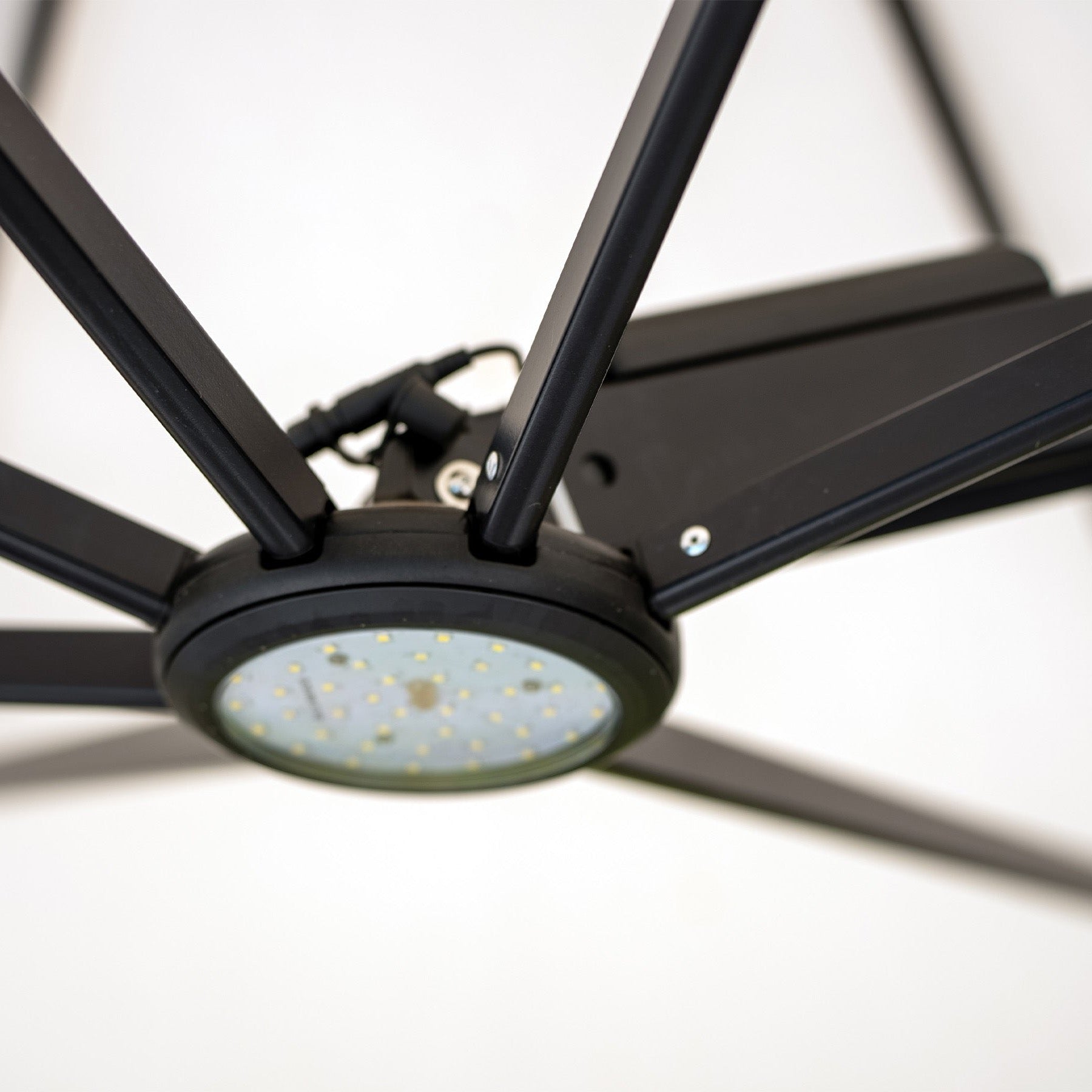 Close-up of the Shadowspec LED light unit at the umbrella hub