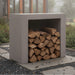 Ochre Living log store positioned on a stone patio, displaying a large firewood storage unit filled with stacked logs in a landscaped outdoor garden area.