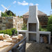 Installer rendering the side bench section of the Ochre Living Ossa Complete Fireplace Kit during outdoor fireplace installation in a backyard setting.