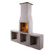 Angled product image of the Ochre Living Ossa Complete Fireplace Kit with left and right bench storage sections and a rain cap on the chimney, shown on a plain background.