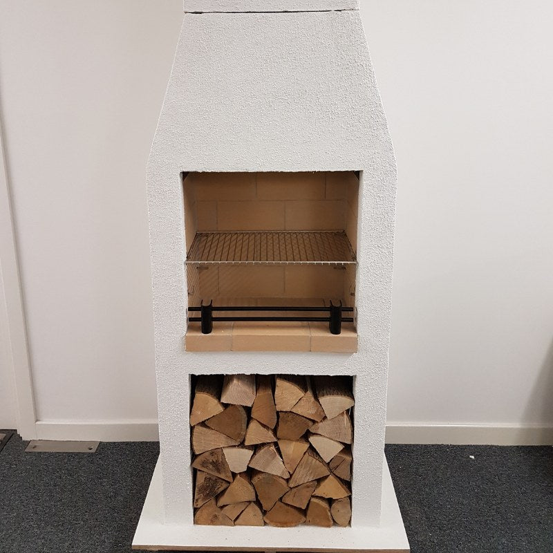 Angled front-right studio image of the Ochre Living Ossa Complete Fireplace Kit with three lower storage openings and a rendered chimney fireplace design on a plain background.