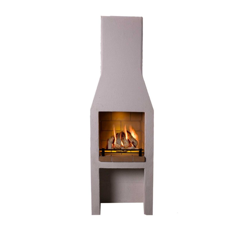 Wide backyard photo of the Ochre Living Ossa Complete Fireplace Kit installed beside an outdoor dining area, showing how the fireplace fits into Australian outdoor living spaces.