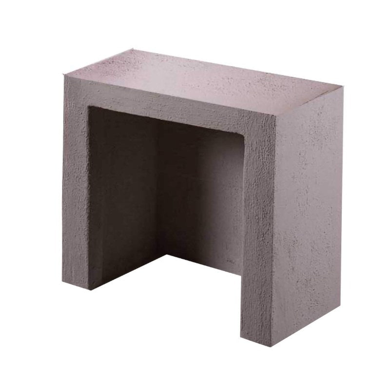 Ochre Living Side Log Store Ossa shown as a standalone outdoor fireplace log storage unit with a textured concrete finish and open front cavity on a clean white background