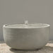Pietro Stoneware Cascade Bubbler Fountain in natural cement, studio shot