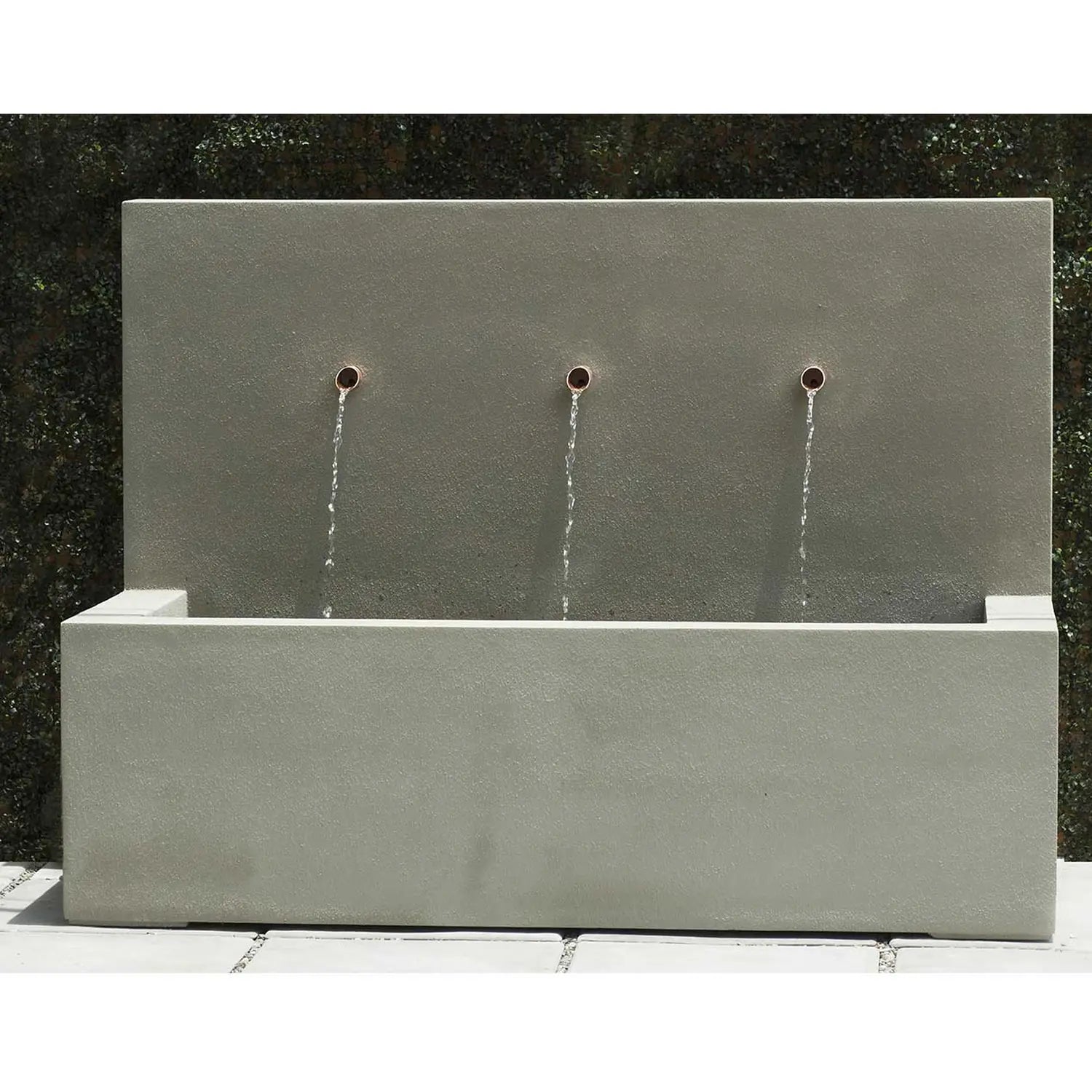 Pietro Stoneware Weathered Zinc 3 Spout Fountain, in a courtyard
