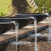 Pietro Stoneware Wok Spillway Bowl, black, three bowls pouring into a pool