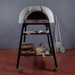 Front view of the Polito Antonius Garden Wood Fired Oven on a black steel stand with timber storage, pizza peels, and pizza tools displayed in an outdoor entertaining setting
