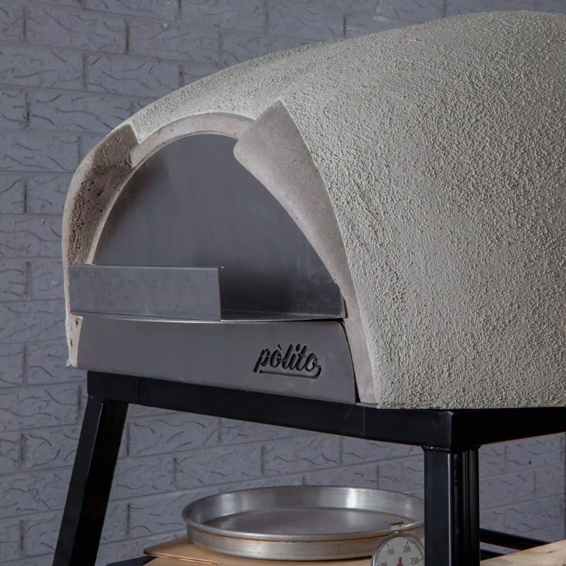 Side profile of the Polito Antonius Garden Wood Fired Oven fitted with a stainless steel oven door and textured insulated dome positioned on a black steel oven stand