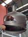Polito Giotto Gas pizza oven with the gas burner lit in the centre of the cooking floor