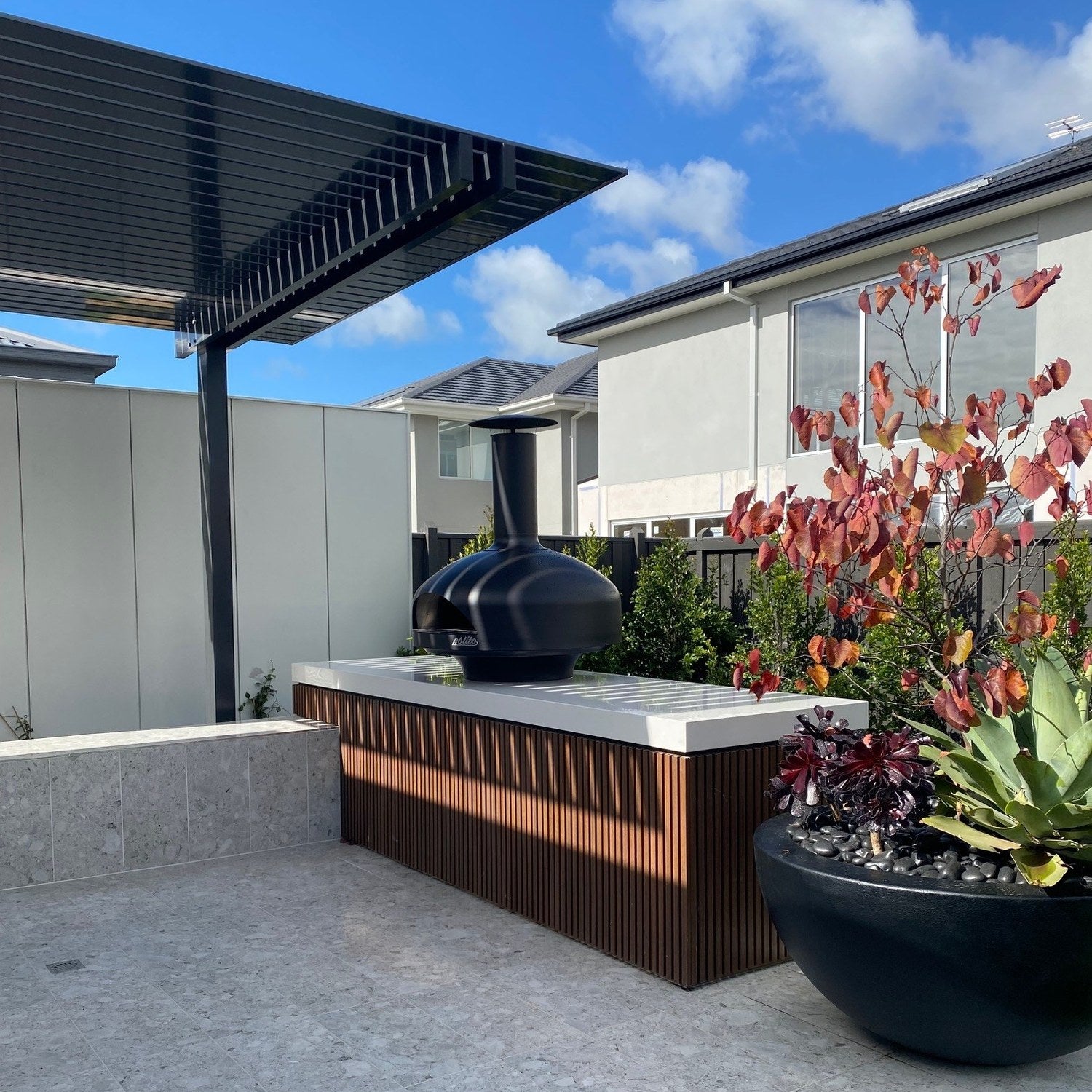 Polito Giotto in Black set into a finished outdoor kitchen bench