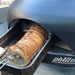 A rolled roast cooking in the chamber of a Polito Giotto