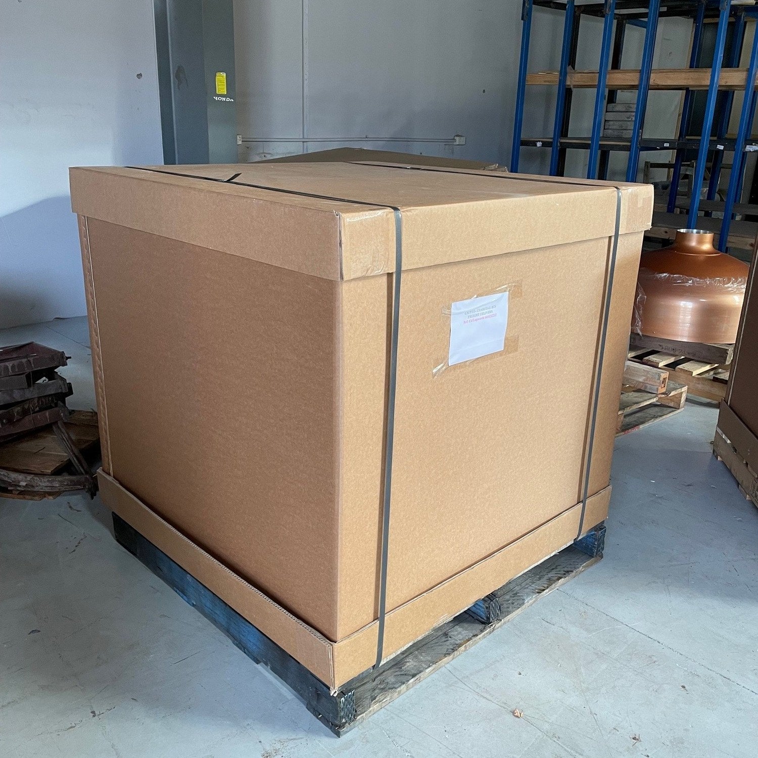 A Polito Giotto crated on its pallet, as it ships