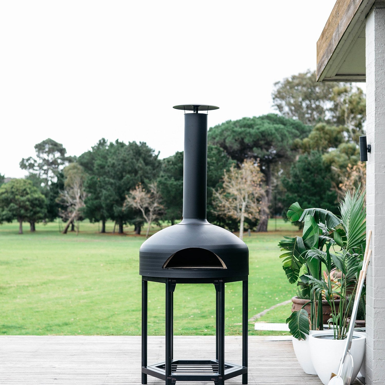 Polito Giotto in Black on a deck overlooking a lawn