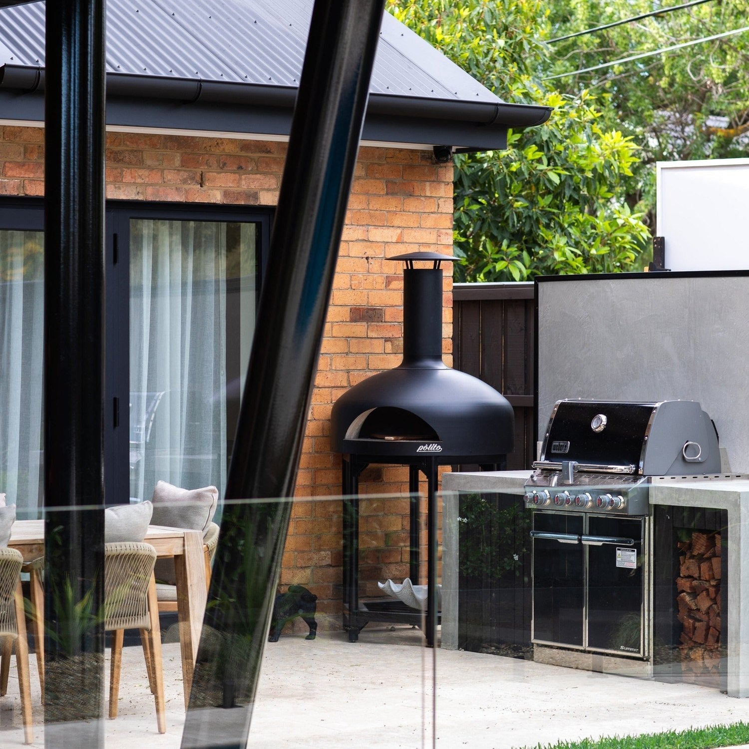 Polito Giotto in Black in an outdoor kitchen, viewed from the side