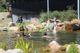 An Aquascape recreation pond showing the swimming area and the planted gravel wetland filter