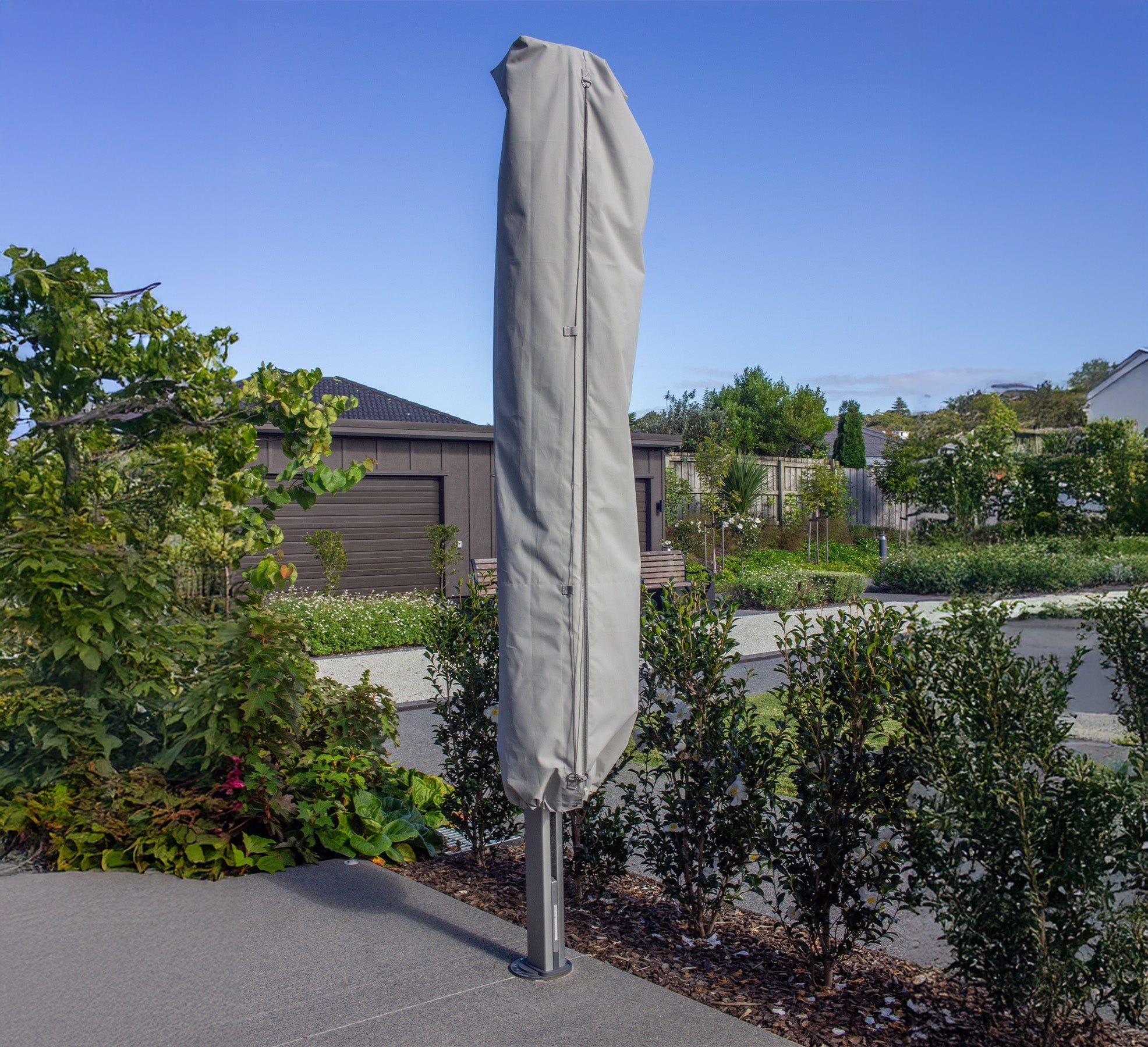 Shadowspec Protection Cover fitted over a closed Oasis market umbrella