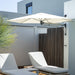 Shadowspec Retreat wall-mounted umbrella with an Oyster canopy over poolside loungers