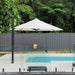 Shadowspec Serenity cantilever umbrella, octagon Oyster canopy on a Heron Black frame, beside a pool