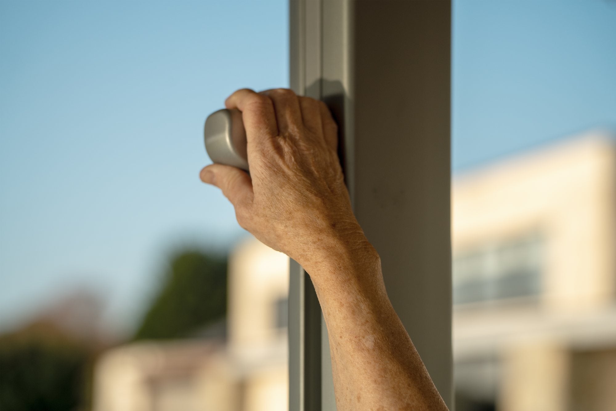 Hand operating the Shadowspec Serenity lift handle