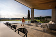 Shadowspec Serenity umbrella closed and stowed on a terrace