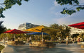 Shadowspec SU10 commercial centre pole umbrella in a public space