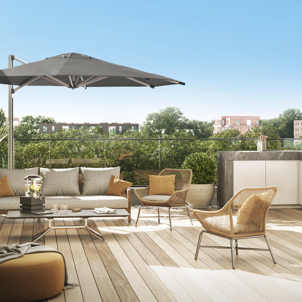 Shadowspec SU4 tilting offset umbrella in grey over a rooftop lounge setting