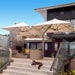Shadowspec Unity twin-canopy cantilever umbrella over a deck