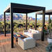 Black SkyFlex Delta motorised aluminium louvred pergola on a timber deck with lounge seating and mountain views