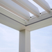Close-up detail of a white SkyFlex Delta motorised aluminium louvred pergola corner and roof louvres