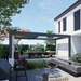 Render of a black SkyFlex Delta Open Sky motorised aluminium louvred pergola in a modern garden, shading an outdoor kitchen and dining area