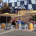 Shadowspec Oasis umbrella over an outdoor dining table
